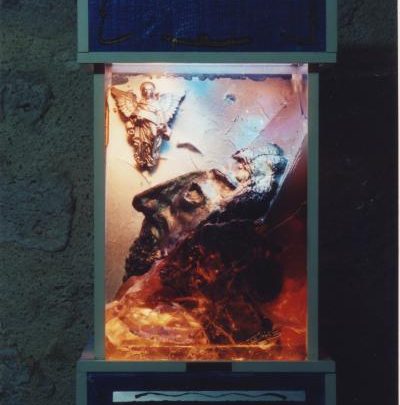 Sculpture du visage du Christ et l'ange gardien